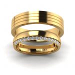 Uroczysty blask - Obrączki ślubne z żółtego złota z diamentami