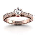 Dostojna elegancja - Pierścionek zaręczynowy z różowego złota z białym szafirem i diamentami
