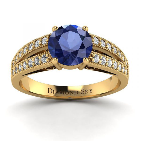 Diamentowe piękno – Pierścionek z białego złota z szafirem i diamentami